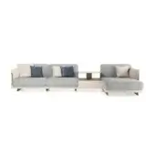 Modular sofa, gray textured fabric, chaise lounge with navy & beige pillows, light beige base, brass legs, rectangular side table.
