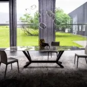 Exceptional Cattelan Italia Planer CrystalArt table with glossy glass top and dark angular steel base