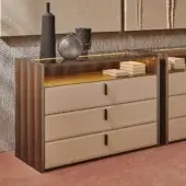 Superior Turri Vendome dresser with Eucalyptus or walnut wood construction and clear glass top with integrated lighting in a light tan finish