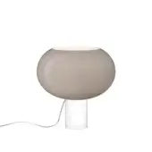 Foscarini Buds table lamp, gray, with rounded shade and translucent white cylindrical base, black cord, studio shot.