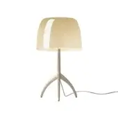 Foscarini Lumiere Grande table lamp, champagne white, rounded shade with interior light stripe and tripod aluminum base.