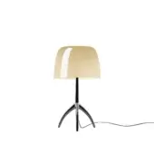 Foscarini Lumiere Piccola table lamp, warm white shade, black base, tripod legs, minimalist design, studio lighting, matte finish.