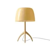 Foscarini Lumiere Nuances table lamp in Creta, large rounded shade, glossy pale yellow, beige tripod base, white power cord.