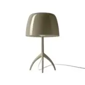 Foscarini Lumiere Nuances table lamp, beige glossy shade, tripod base, studio shot, neutral color, organic curved legs, gray power cord.