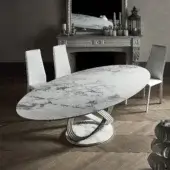 Harmonious Bontempi Fusion table with sculpted marble top displaying grey and white patterns and glossy finish crafted with intertwining matte metal supports