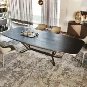 Distinctive Cattelan Italia Planer Wood table with black-stained wooden barrel top and angled edges built with a dark matte metal X base