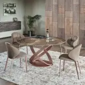 Distinctive Bontempi Fusion round table with blended brown faux marble and looping rose-gold metal tubes exhibiting a glossy finish