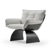 Grey swivel armchair with tufted cushion, dark band detail, and molded black plastic boomerang base, studio shot.