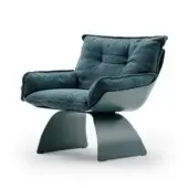 Teal armchair with sculpted form, tufted boucle upholstery, and pedestal base, finished in matte sage color, shown on white background.