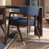 Distinguished Turri Madison armchair with dark blue faux leather padding and glossy lacquered light gold metal feet
