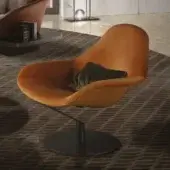Exceptional Reflex Zenith lounge chair upholstered in dark orange textile with a glazed stainless steel swiveling base and green pillow