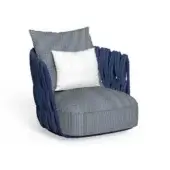 Navy blue armchair with rounded shape, striped fabric upholstery, and thick rope armrests, paired with matching and textured off-white pillows.