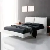 Sophisticated Cattelan Italia Lukas bed with smooth white synthetic leather upholstery and sleek chromed steel feet