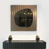 Superior BelMondo by Bellotti Ezio Auriga mirror with undulating frame in muted gold and bronze tone metal finish