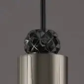Black faceted sphere pendant light, cylindrical brushed metal stem, modern geometric design, Dotto collection fixture detail.