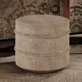 Elegant BelMondo Lexington Avenue ottoman presents a light beige cylindrical form with textured fabric-like appearance and stitched rings