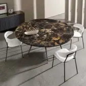Lavish Sovet Italia Arkos XXL table with stone tabletop exhibiting black and gold marbled tones plus glossy finish