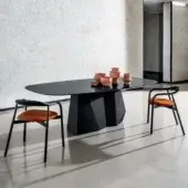 Distinguished Sovet Italia GranDeod table with sculptural lacquered metal and laminated ceramic, exhibiting a sleek black glossy finish