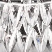 Carved glass panel, transparent material, repeating geometric diamond pattern with polished ridges creating light and shadow effects.