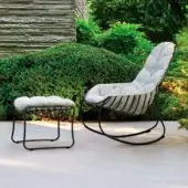 Distinctive Royal Botania Folia Rocking Lounge Chair with light gray fabric and powder-coated metal evokes organic forms for relaxing comfort