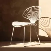 Superior Royal Botania Ostrea lounge chair crafted in coated stainless steel with a smooth white finish and textile cushion