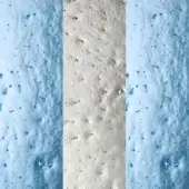 Gradient texture triptych, sky blue and grey tones, translucent material with dense water droplets creating a rippled, reflective surface.