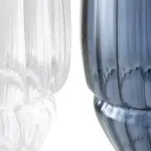 Glass vases, transparent and blue-smoked, with ridged vertical texture and rounded bulbous forms, part of the Boboli collection.