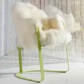 Lavish Vismara Dolly armchair with Mongolia covering and light green satin finished metal frame