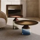 Distinguished VENICEM Equilibre coffee table with delabré brass tabletop and blue blown glass base exhibiting a gradient finish