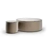 Refined Reflex Aura ottoman with neutral beige fabric upholstery and detailed crossed stitching