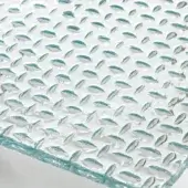 Textured Rugiada rug, translucent material, dense diamond pattern, neutral gray base with turquoise accents, iridescent quality, diffused studio lighting.