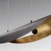 Pendant light, dark gray metal and aged copper, asymmetrical curved forms with cylindrical opening and textured disc.
