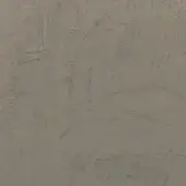 Beige argilla ecomalta texture displays mottled tone, granular surface, and irregular dark speckles evoking eroded rock or sand dune patterns.