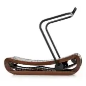 Curved exercise machine in walnut with layered wood deck, black metal frame, and arcing handles, studio shot on white background.