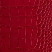 Red crocodile-embossed leather texture sample displaying a repeating rectangular scale pattern and subtle grain variations, labeled “pinetti florida leather”.