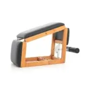 Pilates reformer, cherry wood and black leather, rectangular armrests with arrow detail and adjustable metal mechanism.