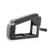Pilates reformer, black leather and dark wood, rectangular frame with pivoting headrest and chrome crank.