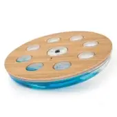 Circular fountain with light wood grain top, turquoise blue reservoir, nine circular cutouts, and central “HOMED” control panel.