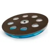 Circular table lamp with dark brown wood base, eight clear cup cutouts, turquoise light, and central ON/OFF control.