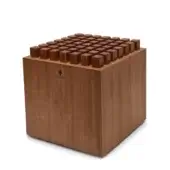 Wooden cube with grid of protruding blocks, light wood grain, matte finish, dark triangular symbol, and “NOHRD” text on front face.