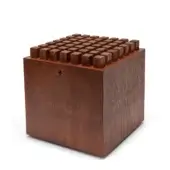Wooden cube with pixelated wood block top, reddish-brown finish, upward-pointing triangular arrow, and “NOHRD” text on a white background.