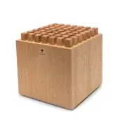 Wooden box with grid of rectangular blocks, light wood grain, dark triangular arrow, and "NOHRD" text on white background.