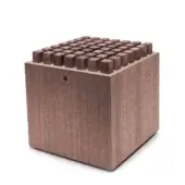Wooden knife block with textured rectangular grid top, warm brown tone, vertical grain sides, and NOHRD logo.