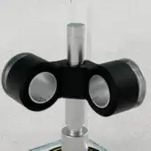 Pirelli Accents binoculars on silver metal stand, black textured cylinders with silver eyepiece rims, gray background display.