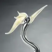 Glass sculpture, pale yellow and gold, abstract bird form with curved metal stem and textured, translucent wings.