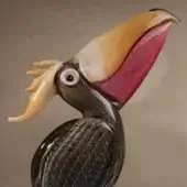 Glass pelican figurine, gradient beak, red to yellow, grey body with gold feather pattern, white head, black eye, cylindrical base.