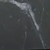 Dark gray marble texture with irregular white veining, polished surface, and subtle highlights; “takto adagio type – black” text visible.