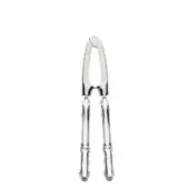 Silver nut cracker with articulated design, serrated jaw, and ridged handles; Wüsthof brand embossed, polished metallic sheen, white background.