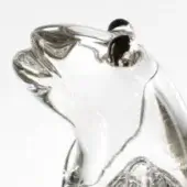 Glass frog sculpture, clear material, seated pose with head turned right, minimalist form, studio lighting, white background.