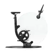 Ciclotte exercise bike, black metal, circular transparent flywheel enclosure, minimalist design, studio shot, glossy finish, wide black platform base.